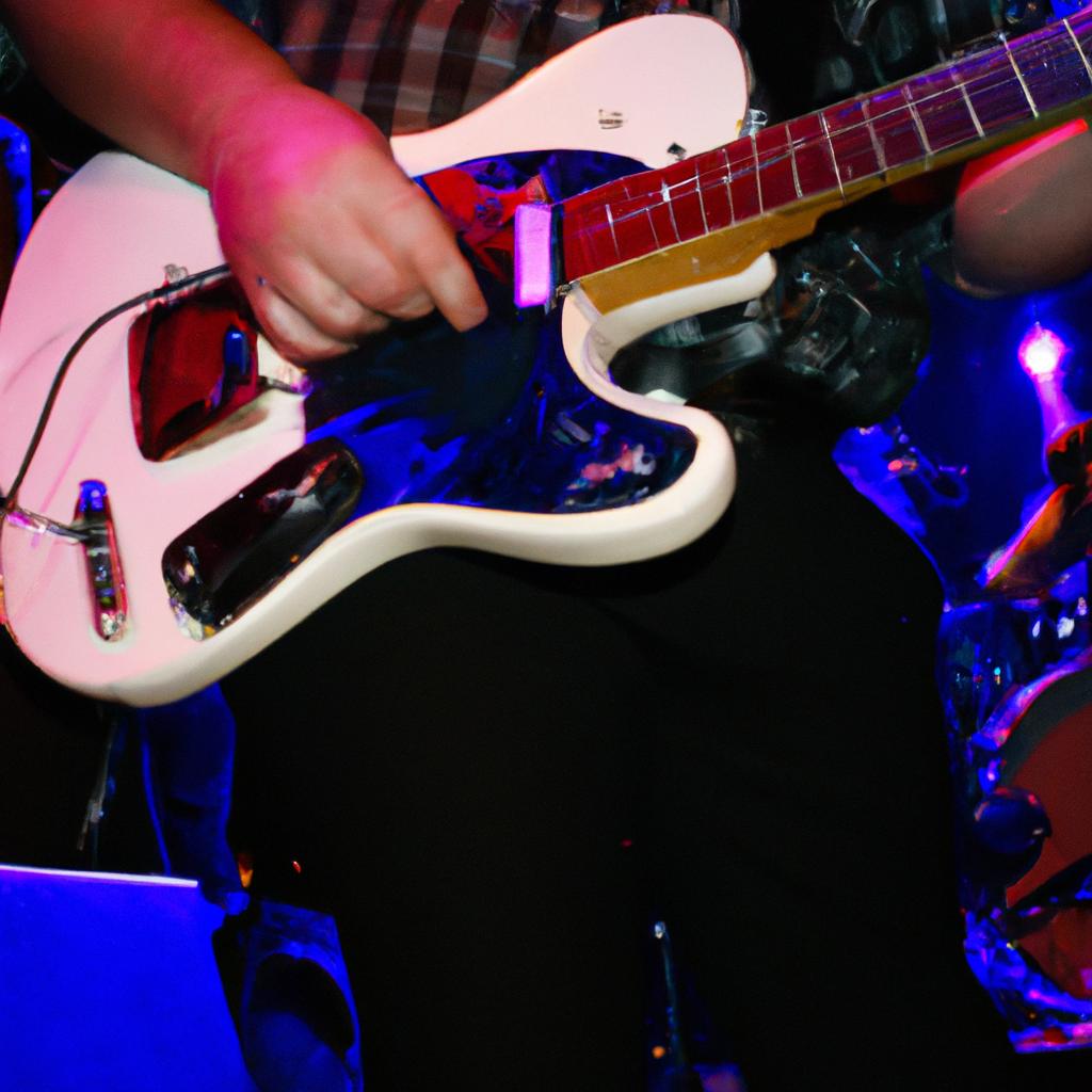 Person playing musical instrument onstage