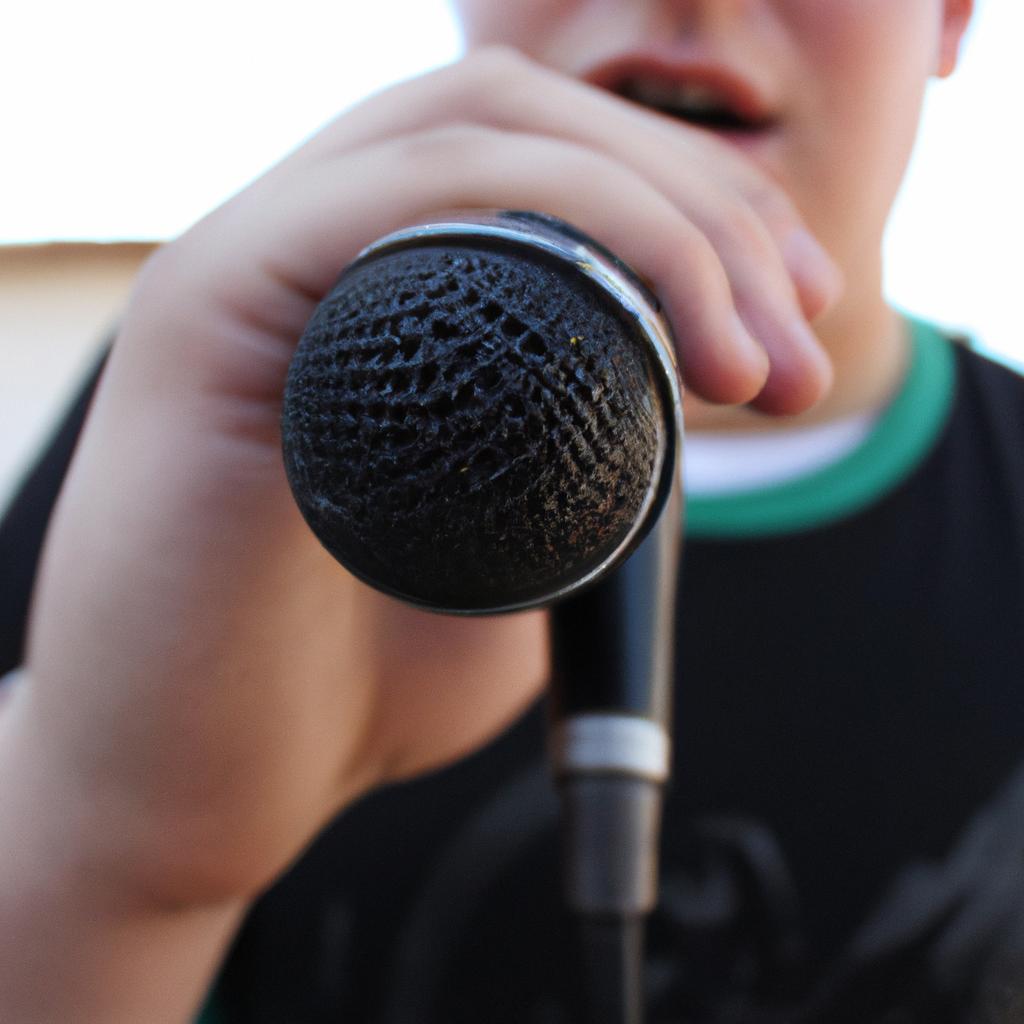 Person holding a microphone, singing